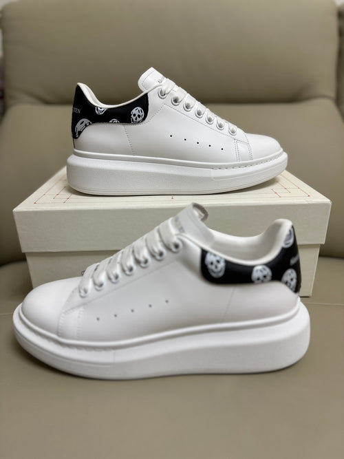 Alexander McQueen Men's Oversized Sneaker – Black with Skull Print Heel