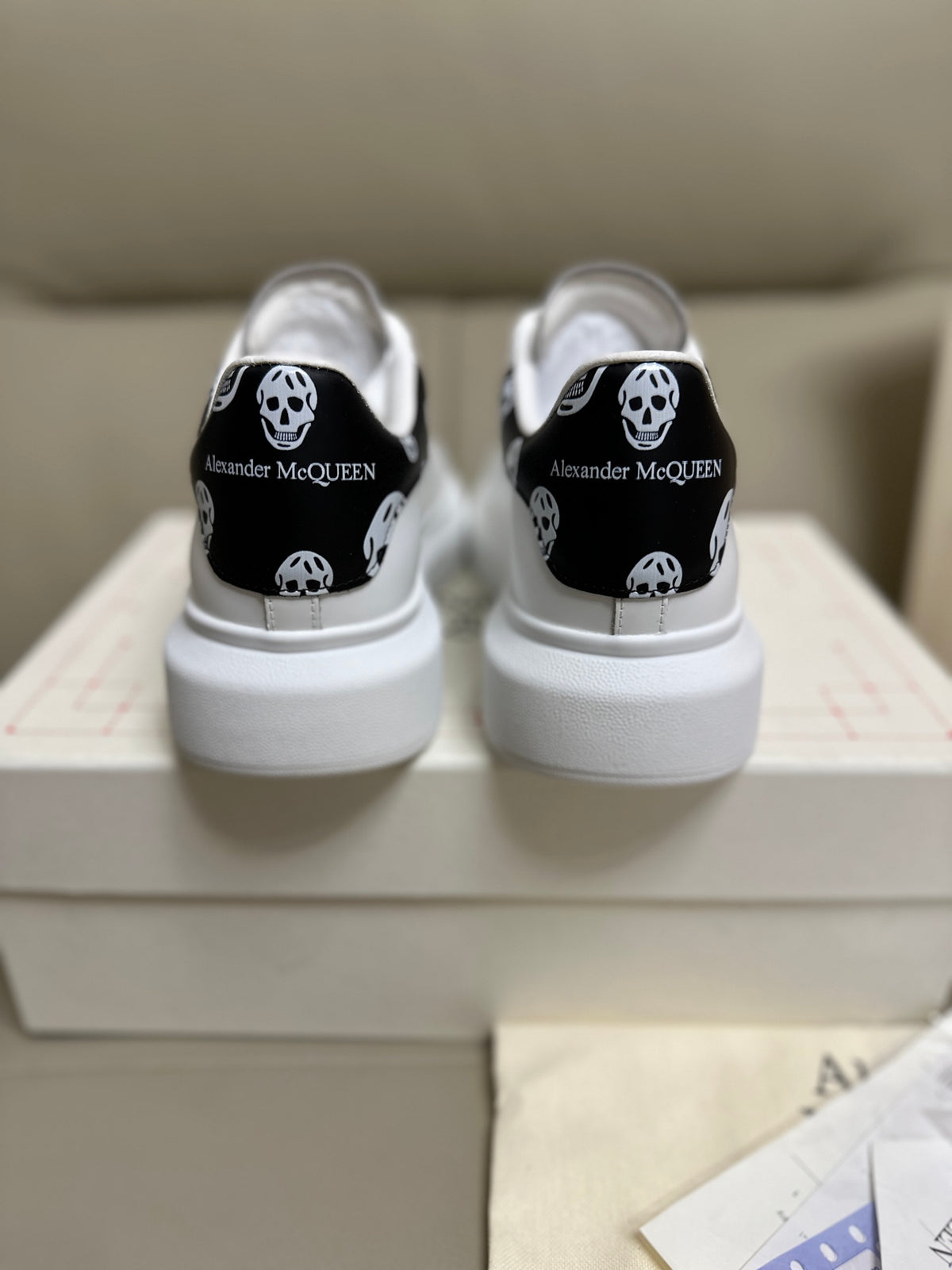 Alexander McQueen Men's Oversized Sneaker – Black with Skull Print Heel