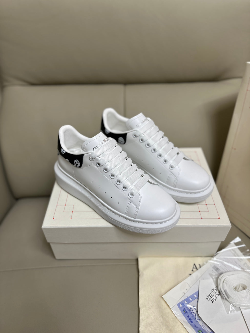 Alexander McQueen Men's Oversized Sneaker – Black with Skull Print Heel