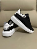 Alexander McQueen Men's Oversized Sneaker – Black with Skull Print Heel