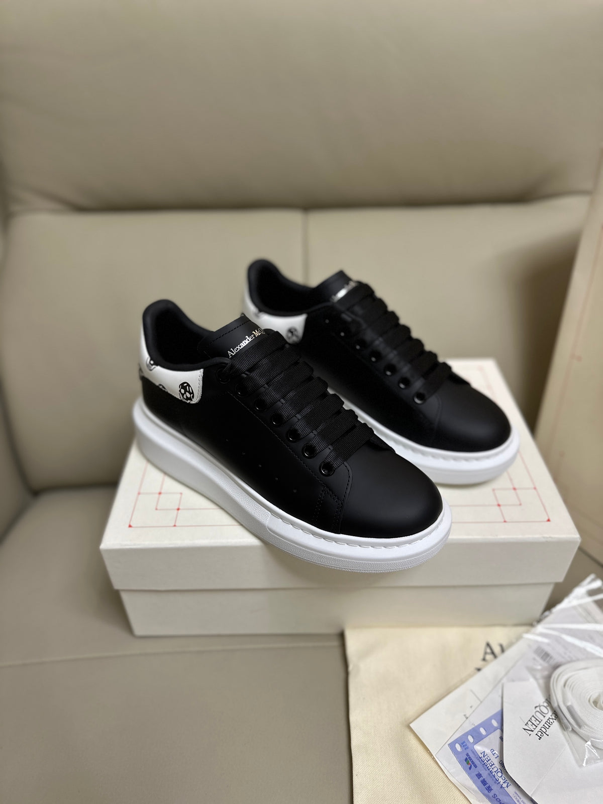 Alexander McQueen Men's Oversized Sneaker – Black with Skull Print Heel