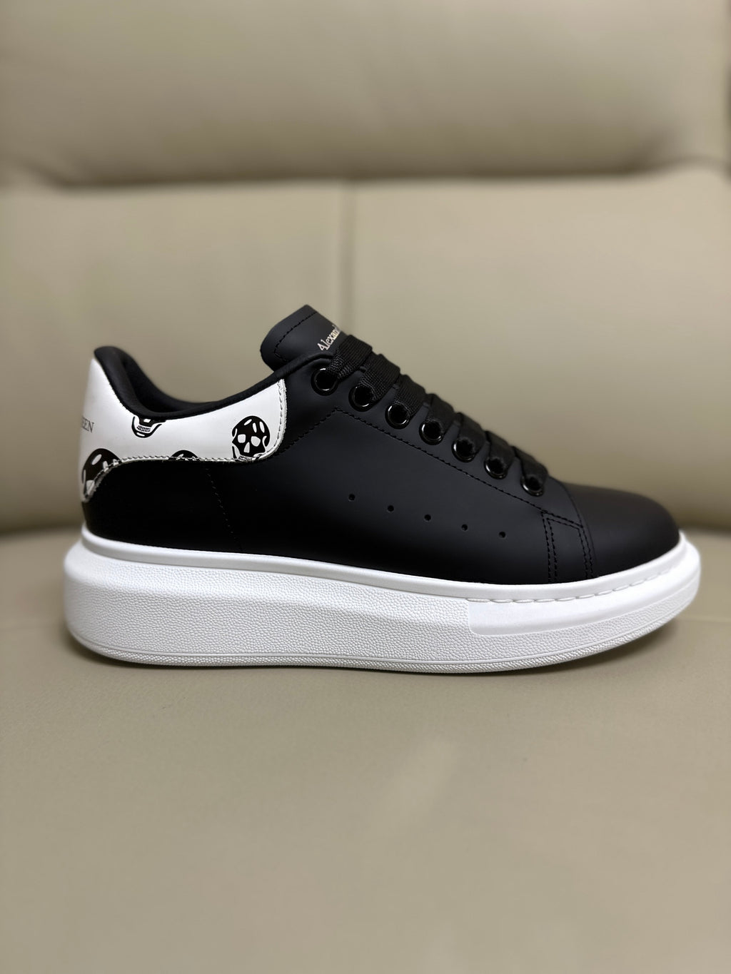 Alexander McQueen Men's Oversized Sneaker – Black with Skull Print Heel