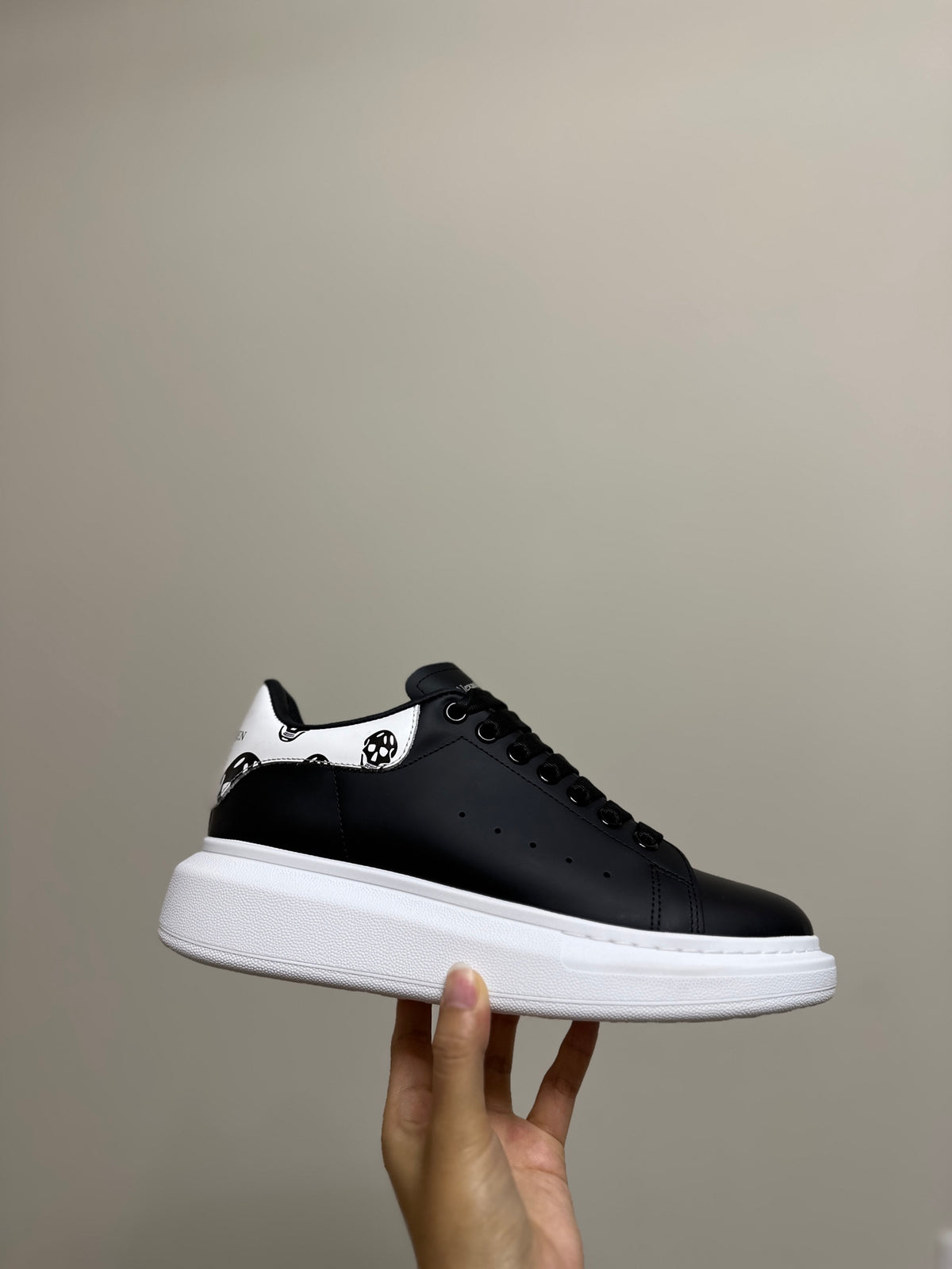 Alexander McQueen Men's Oversized Sneaker – Black with Skull Print Heel