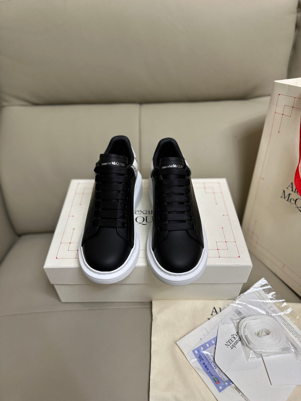 Alexander McQueen Men's Oversized Sneaker – Black with Skull Print Heel