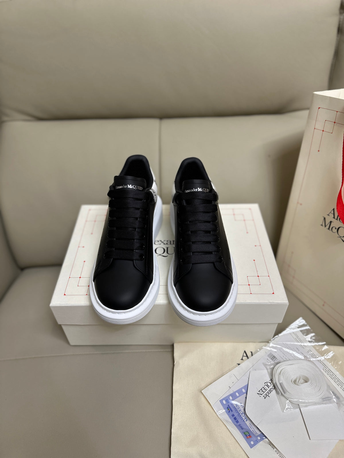 Alexander McQueen Men's Oversized Sneaker – Black with Skull Print Heel